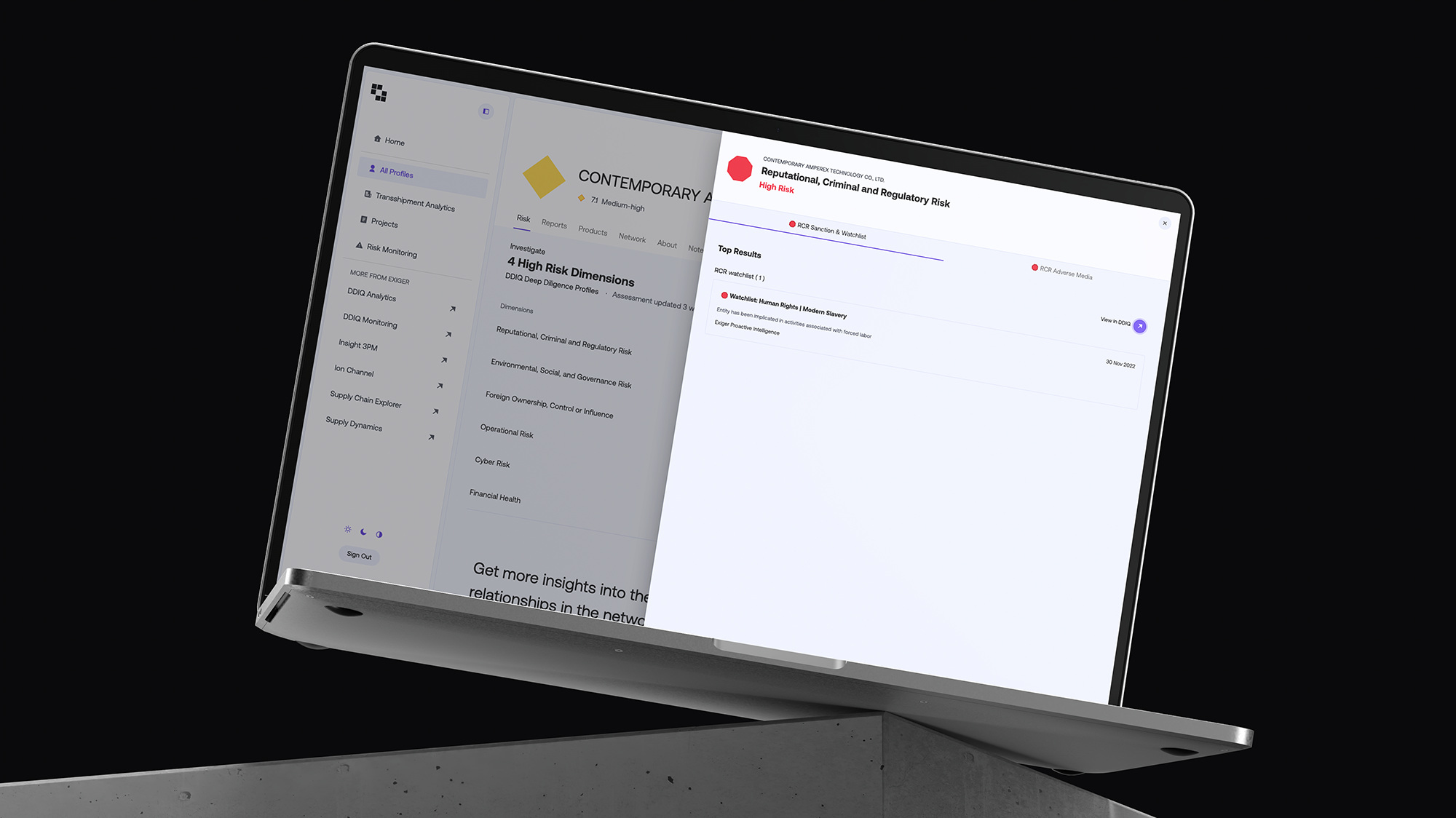 Laptop displaying Exiger’s 1Exiger Risk & Compliance platform with company profile flagged for reputational, criminal, and regulatory risk, showing watchlist alert for human rights and modern slavery violations.