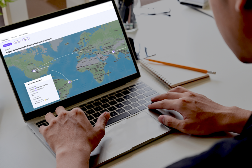 Person using the Exiger Knowledge Graph on a laptop to view a global supply chain map recommending new supplier locations, showing connections between sites in North America, Europe, and Asia with detailed supplier data displayed on-screen.